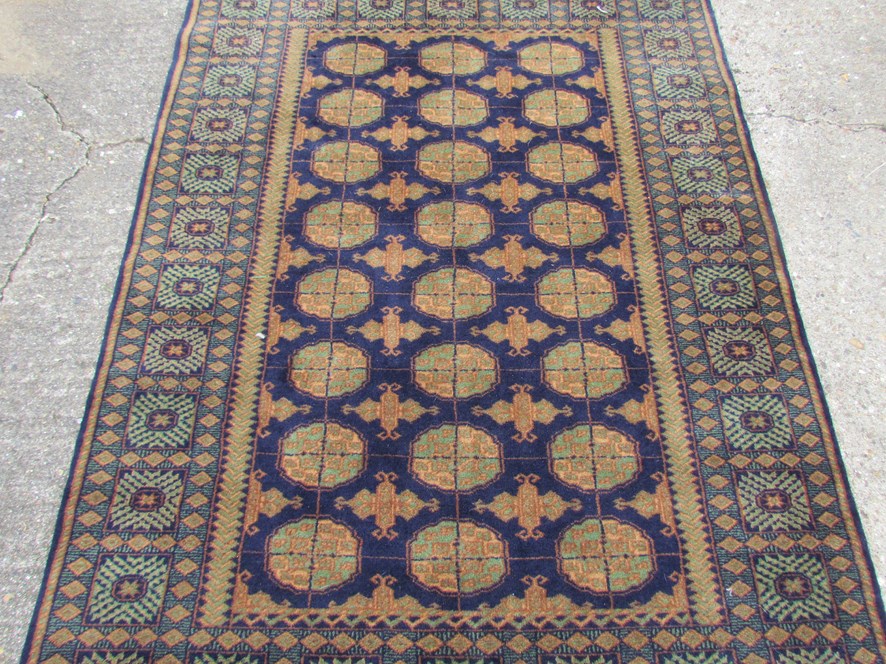 A modern hand woven Middle Eastern rug, - Image 2 of 2
