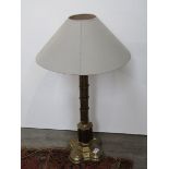 A Gothic style brass lamp with shade