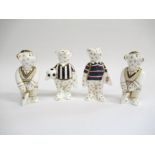 Four Royal Crown Derby mini bear figures, two cricketers, rugby and football,