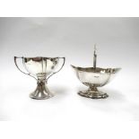 A Hampton Utilities silver sugar basket, shaped body with swing handle and stepped base,