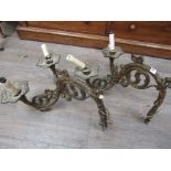 A pair of 19th Century ormolu Gothic wall lights