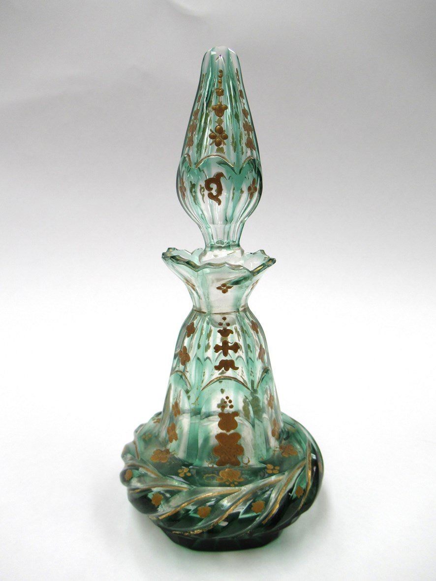 A Victorian cut green overlay clear glass scent bottle of panelled conical form with cushioned base - Image 2 of 4