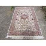 A modern hand made carpet with retail label "Oriental Carpet Bazaar Riyadh" Saudi Arabia,