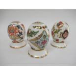 Three Royal Crown Derby Eggs of the World, "Russia", "Italy" and "Japan" all gold stoppers,