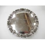 A William Hutton & Sons Ltd silver salver, shaped edge, on three scroll feet,