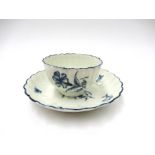 A First Period Worcester blue and white "Cornflower" pattern tea bowl and saucer