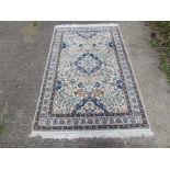 A modern hand made carpet with retail label "Oriental Carpet Bazaar Riyadh" Saudi Arabia,