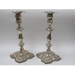 A large pair of silver candlesticks, London 1899,