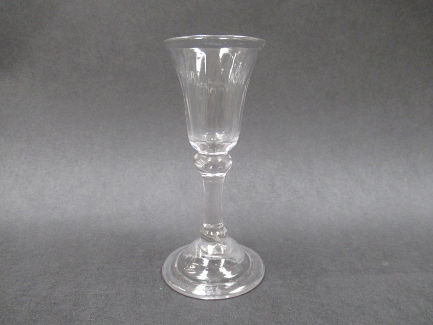 A rare mid 18th Century dram/gin glass with fluted conical bowl,