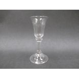 A rare mid 18th Century dram/gin glass with fluted conical bowl,