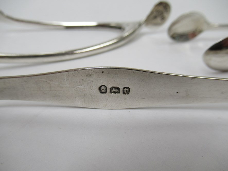 Two pairs of silver sugar tongs including Georgian bright-cut design together with a stirrup - Image 4 of 4