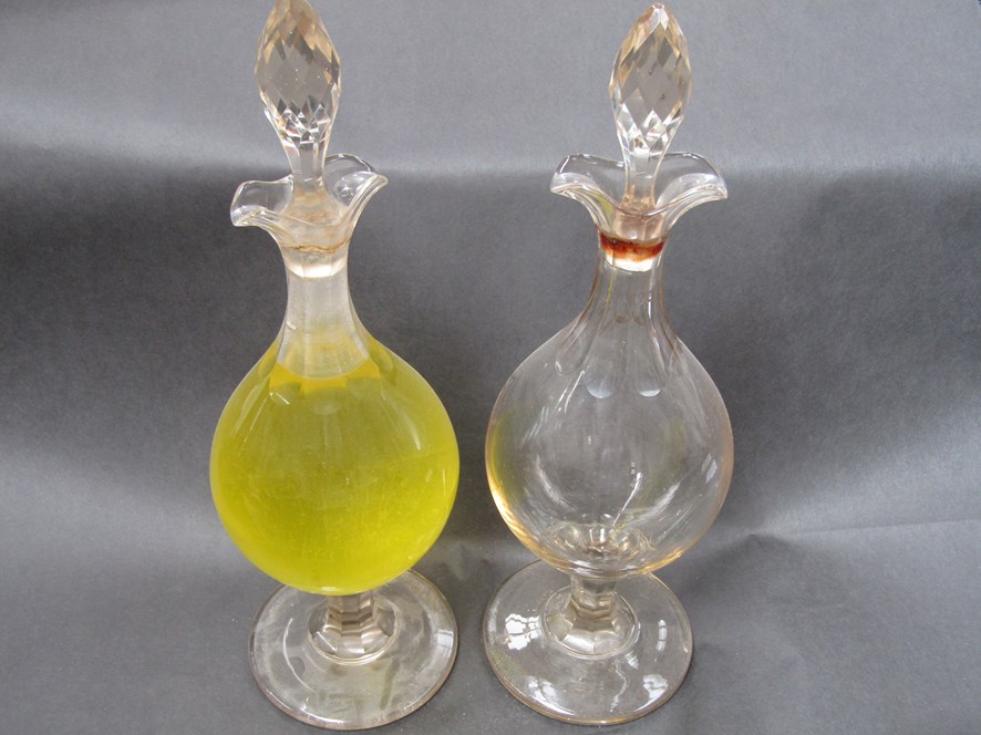 A pair of 19th Century cut glass pharmacy display globes,