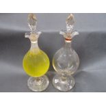 A pair of 19th Century cut glass pharmacy display globes,