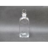 A Georgian clear glass "Shrub" decanter of square section with simple moulded stopper.