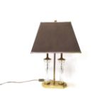 A gilt and twin Waterford glass column table lamp with shade