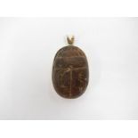 An Egyptian heart scarab - so called because it was usually placed over the heart when a mummy was