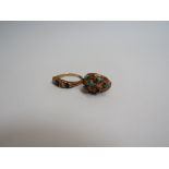 A 9ct gold bark effect ring set with turquoise (one stone missing) and another