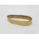 A 9ct gold contemporary bracelet, stamped 375, 19cm long,