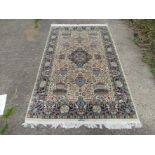 A modern hand made carpet with retail label "Oriental Carpets Bazaar Riyadh" Saudi Arabia,