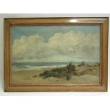 DANIEL SHERRIN (1868-1940): An oil on canvas of sandy coastline, framed, signed lower left.