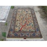 A modern hand made carpet with retail label "Oriental Carpets Bazaar Riyadh",