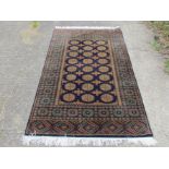 A modern hand woven Middle Eastern rug,