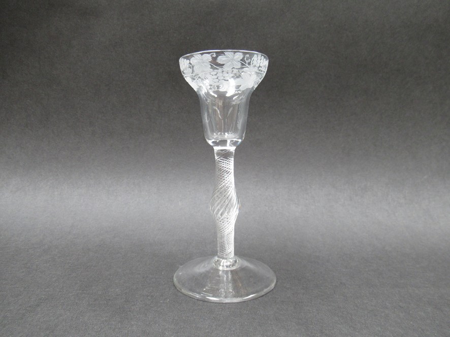 A mid 18th Century wine glass,