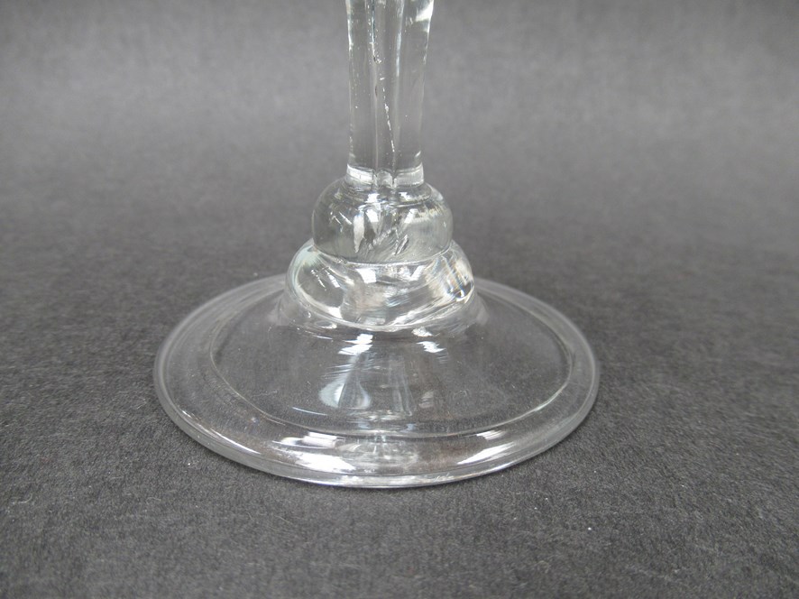 An early 18th Century wine glass with bell - shaped bowl set on a compressed three ring collar knop - Image 2 of 3