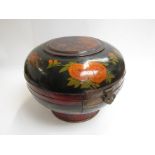 A late 19th/early 20th Century Japanese lacquered lidded box with bird and floral decoration,