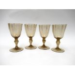 A set of four 19th Century smoky soda glass glasses,