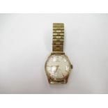 OMEGA: A 9ct gold gentleman's manual wind wristwatch,