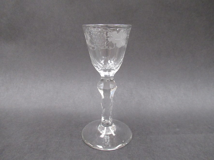 A late 18th Century wine glass,