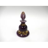 A 19th Century mauve/aubergine overlay opaque glass scent bottle,