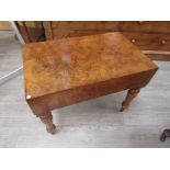 A Victorian walnut bidet, rectangular form, on turned supports,