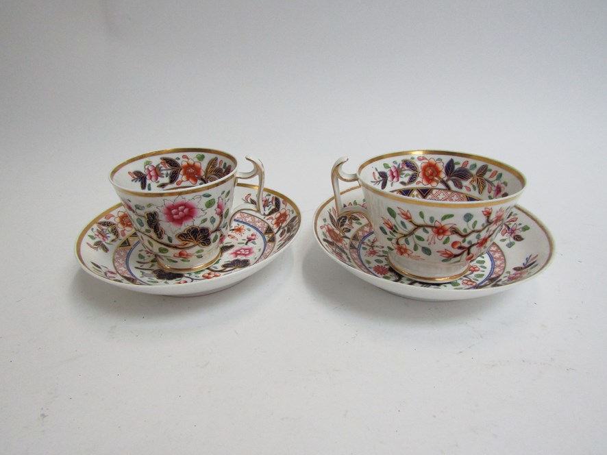 A pair of early 19th Century Spode cups and saucers with London hallmarks