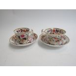 A pair of early 19th Century Spode cups and saucers with London hallmarks