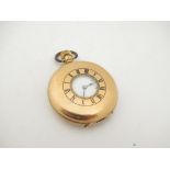 A gold plated half hunter pocket watch with Dennisan case,