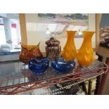 A selection of glassware including a pair of orange vases,