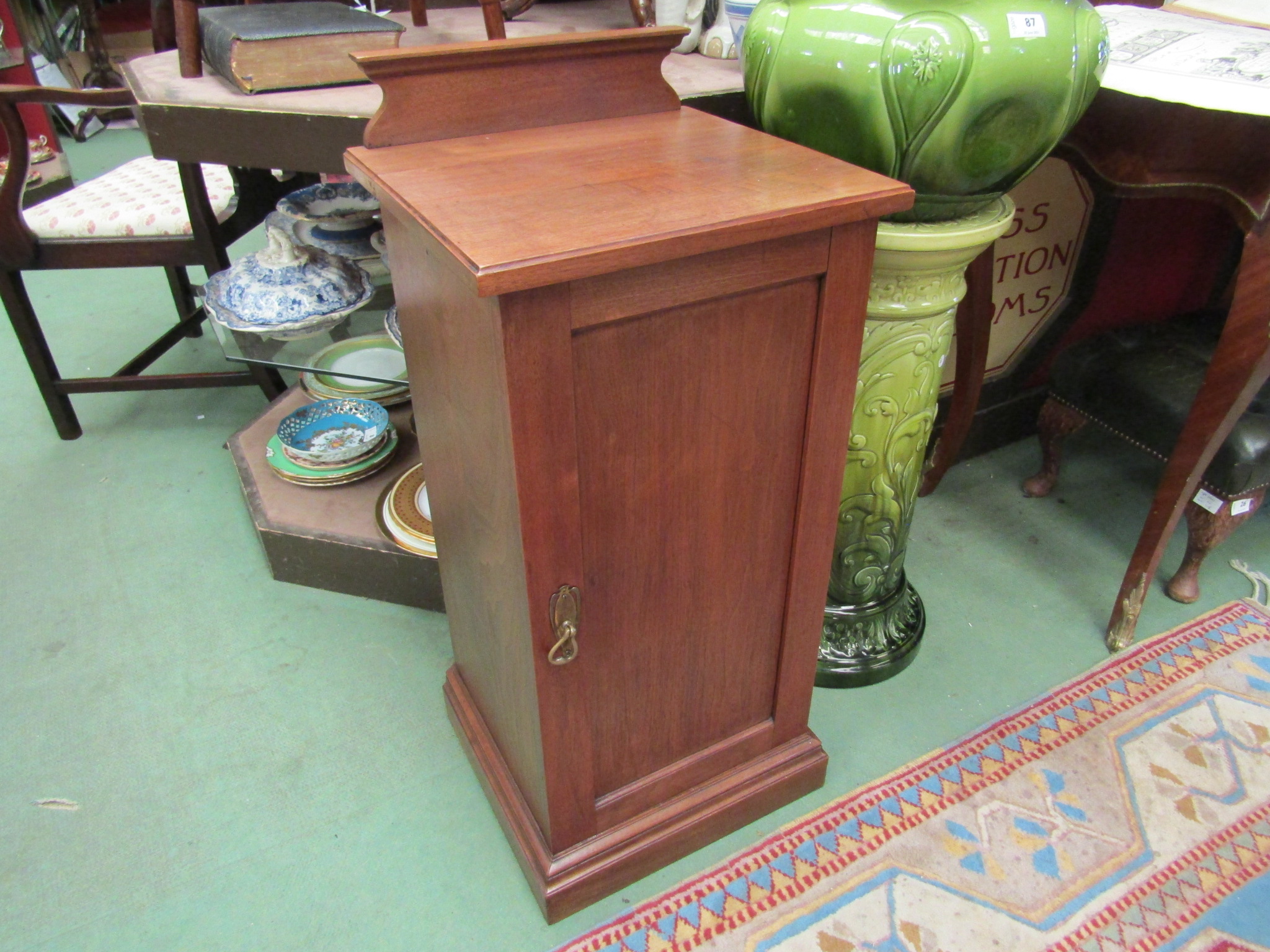 A circa 1900 satin walnut single door bedside cabinet,