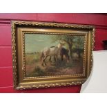 SCHMIDT (XIX): An oil on canvas of horses grazing under tree at fields edge, gilt gesso frame,