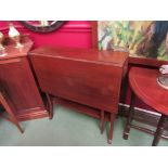 An Edwardian mahogany Sutherland table, 21.5cm x 76.5cm.