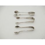 Three pairs of silver sugar tongs of plain form, various makers and dates including Frank Cobb & Co.