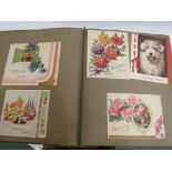 Three albums of assorted greeting cards, good quantity of,