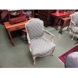 A pair of 19th Century French painted Fauteil armchairs, green upholstered,