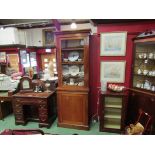 A Victorian mahogany pier bookcase on base the single glazed door and adjustable height shelves