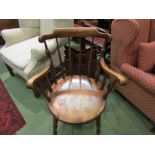 A mahogany penny seat armchair, stick-back with turned supports,