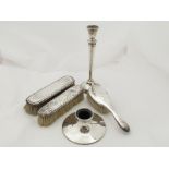 A silver candlestick,