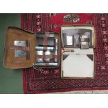 A leather cased gents vanity/shaving kit and similar case