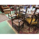 A circa 1820 North Country elm and oak rush seat elbow chair with turned decoration