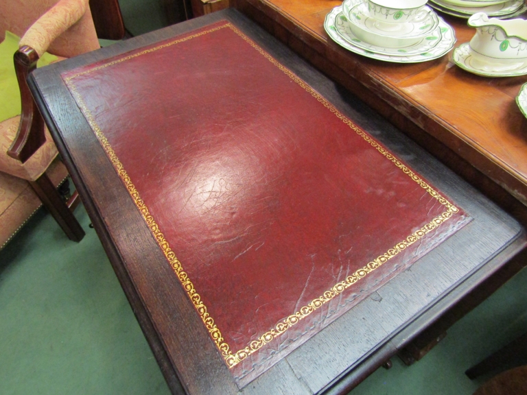 A mid Victorian oak writing desk the tooled leather inset over a single frieze drawer with key on - Image 2 of 3